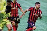  ?? CURTIS COMPTON / CCOMPTON@AJC.COM ?? Midfielder Eric Remedi says the team remains positive and wants to address what it’s doing wrong. “We want to get back to being a team that’s a protagonis­t in matches,” he says.