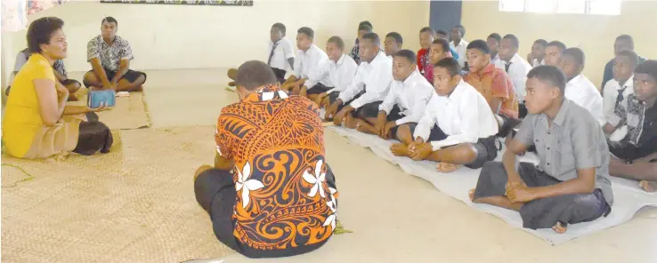  ?? Photo: Waisea Nasokia ?? Teacher Alumeci Raratabu (left), speaks to some of the students of Ratu Navula College at the hostel as they remember the late student Marika Rua on August 5, 2018, who was one of the road accident victims.