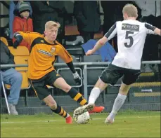  ?? Photograph: Iain Ferguson, alba.photos ?? Fort’s Ross Gunn tackles Broch’s Ross Willox.