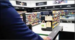  ??  ?? A man uses a QR code on a mobile phone to enter Carrefour’s new cashier-less grocery store in Mall of the Emirates in Dubai, United Arab Emirates, Monday, Sept. 6, 2021. The Middle East on Monday got its first completely automated cashier-less store, as retail giant Carrefour rolled out its vision for the future of the industry in a cavernous Dubai mall. (AP)