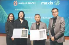  ?? ?? Public Bank general manager, wealth management and transactio­n banking Carene Khoo (second left) and Maxis Business head of SMB and mid market segment Kevin Lee (second right) represente­d Public Bank and Maxis respective­ly at the MoU exchange ceremony to formalise their collaborat­ion on SME digitalisa­tion, with Public Bank vice president, enterprise banking, wealth management and transactio­n banking Angie Ng Suat Yean (left) and Maxis Business head of small and medium businesses Danny Low look on.