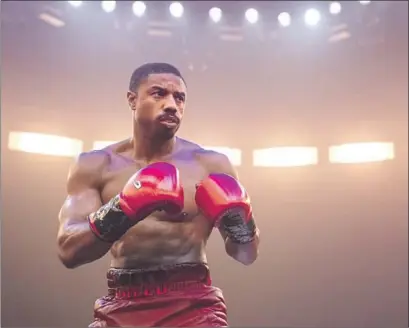 ?? Eli Ade MGM ?? MICHAEL B. JORDAN is the hero of “Creed III,” returning as Adonis Creed and also taking on the franchise’s directing reins.