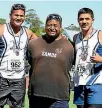  ??  ?? St Pat’s Town discus thrower Gerard Ahnau, left, with his coach Shaka Sola and team-mate Zion Trigger Faitele.