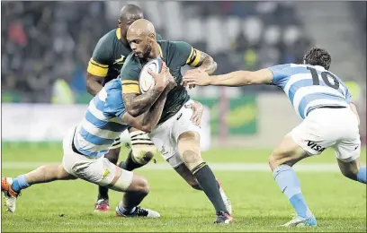  ?? PHOTO: DIRK KOTZE/GALLO IMAGES ?? Springboks’ Lionel Mapoe evades tackles during the Rugby Championsh­ip match against Argentina at Mbombela Stadium last Saturday.