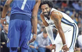  ??  ?? rizzlies guard Mike Conley smiles during action against the Dallas Mavericks at the FedExForum. MARK WEBER/THE COMMERCIAL APPEAL