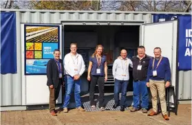  ??  ?? ABOVE: The Compac team in front of the mobile citrus field research unit. From left are: James Flocchini (Compac regional director of China, SA and Mexico), Marius du Preez and Miquette Mienie (technical sales advisor and field service engineer respective­ly at CSESA, Compac’s SA distributo­r), Dean Barker (Compac director R&amp;D projects), Gerhard Verster (CSESA general manager), and Mike Riley (head of Tomra Sorting Solutions Food).