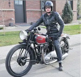  ?? GREG WILLIAMS/DRIVING ?? Mike Jones sits aboard Greg Williams' restored 1939 Triumph T100.