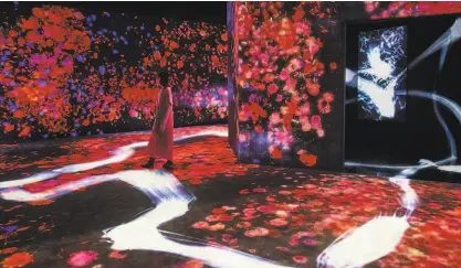  ?? TeamLab ?? Tokyo art collective teamLab’s new installati­on “Continuity” is an immersive digital experience that surrounds viewers with East Asian imagery of lush landscapes and nature.