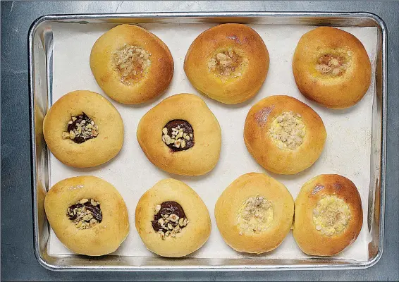  ?? For The Washington Post/DEB LINDSEY ?? Sweet kolaches can be filled with Nutella and crushed hazelnuts; apricot; cheese; and coconut streusel.