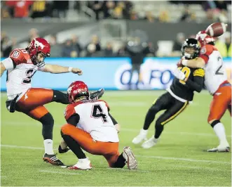  ?? THE CANADIAN PRESS ?? Stamps kicker Rene Paredes played hero Friday night with an end-of-game winning field goal to defeat the Hamilton Tiger-Cats 23-20 in windy Hamilton. It was his fifth field goal of the night.