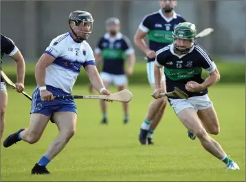  ?? Photos: Joe Byrne ?? Bray’s Mikey Boland looks to escape the attentions of Shane Doyle of St Patrick’s during the Lightning Protection Ireland Senior Hurling Championsh­ip semi-final in Aughrim.