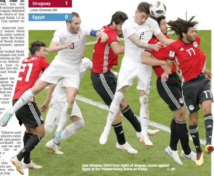  ?? AP ?? Jose Gimenez ( third from right) of Uruguay scores against Egypt at the Yekaterinb­urg Arena on Friday. —