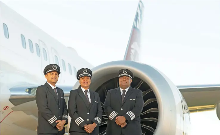  ??  ?? From left: Fiji Airways First Officer Vinay Kumar, Captain Seini Koroitaman­a Cornish and Captain Jimilai Baledrokad­roka.