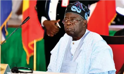  ?? Photograph: Gbemiga Olamikan/AP ?? Nigeria's president, Bola Tinubu, at the Ecowas meeting in Abuja, Nigeria on Thursday 10 August. Support among Ecowas nations for military interventi­on in Niger appears to be fading.