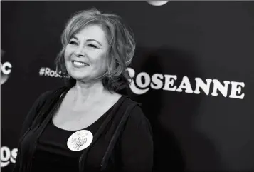  ?? PHOTO BY JORDAN STRAUSS/INVISION/AP ?? IN THIS MARCH 23 FILE PHOTO, ROSEANNE BARR ARRIVES at the Los Angeles premiere of “Roseanne” in Burbank, Calif. ABC on Tuesday canceled its hit reboot of “Roseanne” following Barr’s racist tweet that referred to former Obama adviser Valerie Jarrett as...