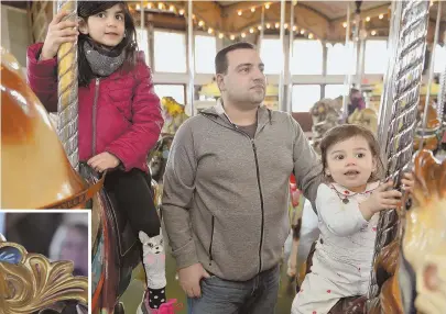  ??  ?? ‘A REAL HAPPY PLACE’: Reem, 6, and her sister Ava, 1, ride the carousel with their dad, Charbel Rjeily, above, yesterday. Taylor Burgess, 6, is all smiles in her bunny ears, top. Carousel icons like the horses, above middle, and ornamental pieces,...