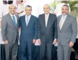  ?? F.E. ?? Julio César Castaños Guzmán, Román Jáquez, Jorge Subero Isa y Samir Chami Isa.