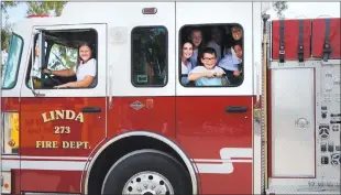  ?? Courtesy photo ?? Arboga Elementary School students, who were part of the Lexus ECO Challenge, check out a truck from the Linda Fire Department.