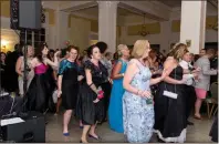  ??  ?? Last year’s 80s themed prom brought out all manner of makeup and costumes to the adult prom. Promgoers can choose the semiformal or black tie options for the event, but many choose to dress for that year’s theme. Last year’s 80s theme brought out a...