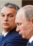  ?? Archivfoto: dpa ?? Wirklich auf Augenhöhe? Victor Orbán und Wladimir Putin.