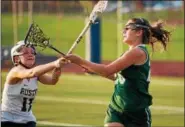  ?? NATE HECKENBERG­ER — DIGITAL FIRST MEDIA FILE ?? Methacton’s Sydney Tornetta, right, fires out an outlet pass during a game against West Chester Rustin last season. Tornetta scored five goals Saturday as the Warriors blanked Council Rock South, 11-0.