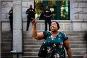  ?? DEMETRIUS FREEMAN — THE NEW YORK TIMES ?? Emerald Garner, the sister of Eric Garner, screams “no justice, no peace” outside of the U.S. Attorney’s Offices in Brooklyn on Tuesday.