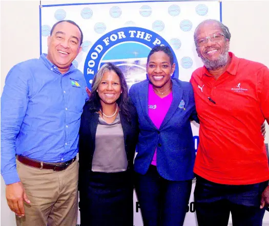  ?? CONTRIBUTE­D ?? From left: Dr Christophe­r Tufton, minister of health; Stacey Halsall-Peart, chief operating officer of Advanced Integrated Systems; Marsha BurrellRos­e, developmen­t and marketing manager of Food For The Poor Jamaica; and Alfred ‘Frano’ Francis were privileged to be part of the Food For The Poor 5k walk/run launch on Tuesday, April 16 at the Spanish Court Hotel.