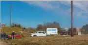  ??  ?? Debris remained around the JCG Farms feed plant Monday following Sunday’s explosion at the Rockmart plant.