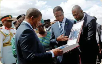  ??  ?? Zambia’s President Edgar Lungu speaks to his Angolan Counterpar­t President Joao Lourenco in Lusaka during a state visit to Zambia in Lusaka