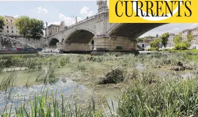  ?? DOMENICO STINELLIS / THE ASSOCIATED PRESS ?? Water levels in the Tiber River are at historic lows due to drought as Rome prepares for water rationing.