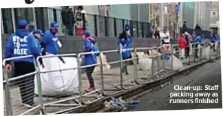  ??  ?? Clean-up: Staff packing away as runners finished Medal moment: Jack Glenny helped raise £6,000