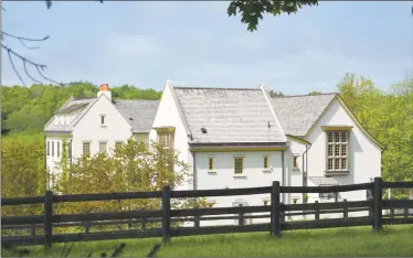  ?? Alexander Soule/Hearst Connecticu­t Media ?? The main residence at Maple Hill Farm on Umpawaug Road in Redding, which was listed for sale in this month for $19 million.