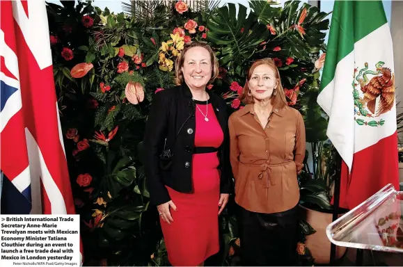  ?? Peter Nicholls/WPA Pool/Getty Images ?? > British Internatio­nal Trade Secretary Anne-Marie Trevelyan meets with Mexican Economy Minister Tatiana Clouthier during an event to launch a free trade deal with Mexico in London yesterday