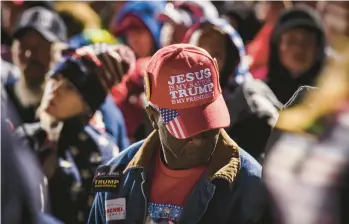  ?? AUDRA MELTON/THE NEW YORK TIMES 2022 ?? A supporter attends a March 26 rally hosted by Donald Trump in Commerce, Ga.