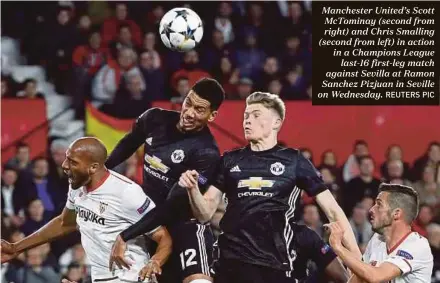  ?? REUTERS PIC ?? Manchester United’s Scott McTominay (second from right) and Chris Smalling (second from left) in action in a Champions League last-16 first-leg match against Sevilla at Ramon Sanchez Pizjuan in Seville on Wednesday.