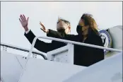  ?? JACQUELYN MARTIN — THE ASSOCIATED PRESS ?? Vice President Kamala Harris and her husband, Doug Emhoff, wave as they board Air Force Two at Andrews Air Force Base, Md., Monday en route to Las Vegas.