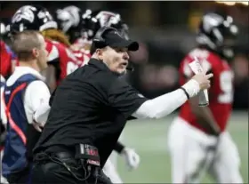  ?? JOHN BAZEMORE — THE ASSOCIATED PRESS FILE ?? Falcons head coach Dan Quinn directs his players during game against Packers. The Falcons play the New York Jets on Sunday, in East Rutherford, N.J.