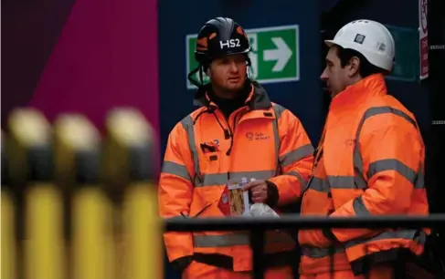  ?? (EPA) ?? End of the line: HS2 workers at Euston in January