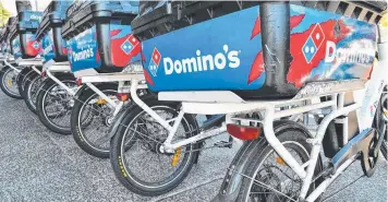  ?? Picture: AAP/DARREN ENGLAND ?? ON NOTICE: Non-payment of delivery allowances by Domino’s was the among breaches uncovered by the Fair Work Ombudsman.
