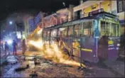  ?? PTI ?? Protesters vandalised a bus during clashes in Bengaluru.