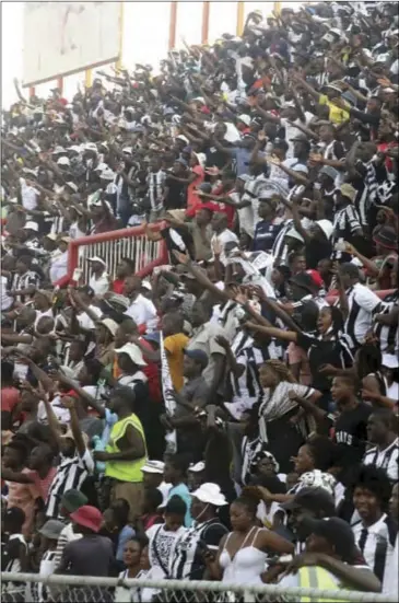  ?? ?? Highlander­s fans during a match at Babourfied­s Stadium. Bosso attracts the highest number of fans during their home matches