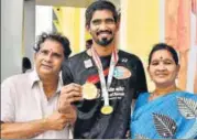  ?? PTI ?? Kidambi Srikanth with his parents in Hyderabad.