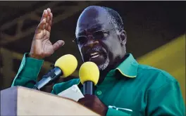  ?? KHALFAN SAID — THE ASSOCIATED PRESS ?? President John Magufuli gestures during an election rally in 2015 in Dar es Salaam, Tanzania. The prominent COVID-19 skeptic whose populist rule often cast his country in a harsh internatio­nal spotlight has died at 61 of heart failure, it was announced Wednesday by Vice President Samia Suluhu.