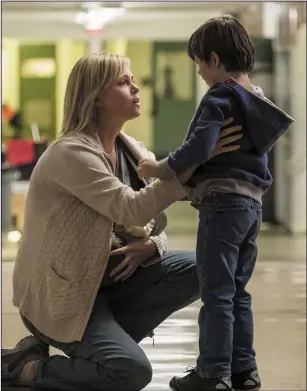  ?? Tully. ?? Charlize Theron as Marlo and Asher Miles Fallica as Jonah in