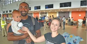  ?? Photo: Waisea Nasokia ?? Paul Farrell Valemei holding 15-month-old Evan Inia Carter Valemei and Welsh-born Victoria Alice Carter at the Nadi Internatio­nal Airport on April 29, 2020.