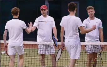  ??  ?? Men’s Doubles Final - runners Up Sean and Daniel Farrell (back) congratula­ting the champions Conor Ruttledge and Peter Finnegan.