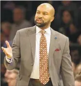  ?? Seth Wenig Associated Press ?? DEREK FISHER, who helped the Lakers win five NBA crowns as a player, replaces Brian Agler.