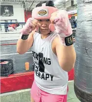  ?? SAVOY HOWE ?? Michelle “Pinky” Trinh is a nurse who boxed competitiv­ely at Newsgirls. At Newsgirls, everyone has a nickname, chosen on their first day, based on their personalit­ies or last names, often given to them by Howe.