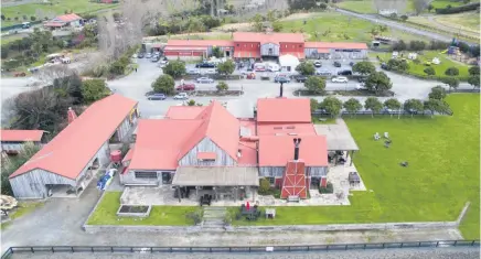  ??  ?? The property at 1151 Leigh Rd (above); the rustic complex hosts art shows and a crafts market (far left); Matakana Country Park comprises eight separate parcels of freehold land (left).