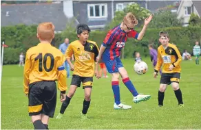  ??  ?? Dundee North West Community Fun Day saw Dundee West (red/blue) face Maryfield United Age 12. More pics and reaction in tomorrow’s Tele.